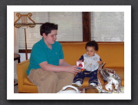 Ari and Kayla enjoy a book together