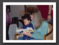 Sarah reads to Kayla