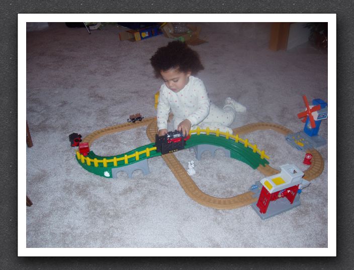 Kayla loves her trains from Nanna and Papa