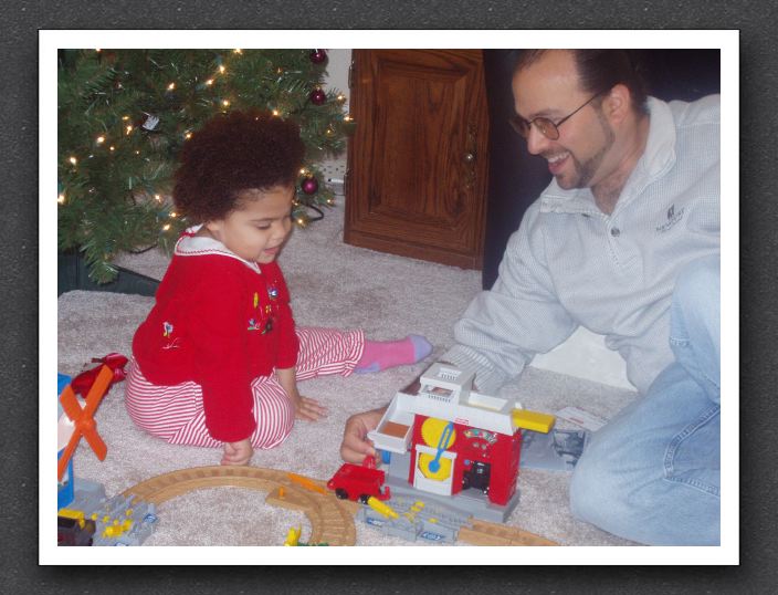 Daddy likes the train set, too