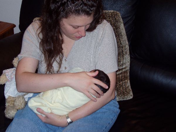 Safe And Snuggly In Aunt Jenn's Arms