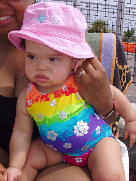 "Hats and bathing suits... yeah, yeah, can we just take the picture and go home please?"