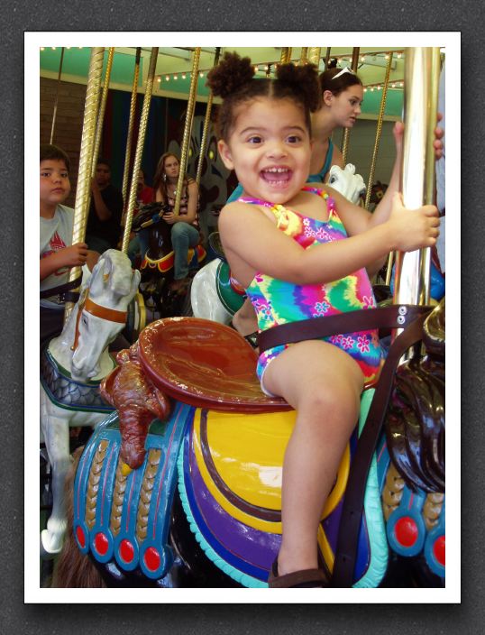 Wild girl on the carousel