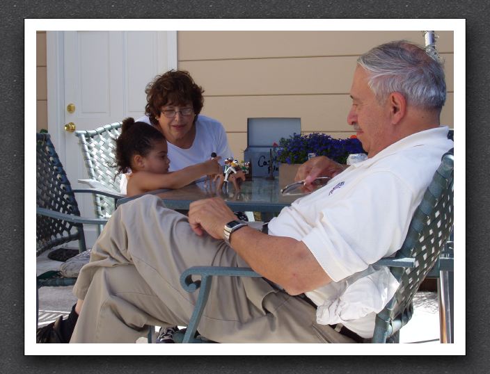 Kayla plays with Nana and Papa