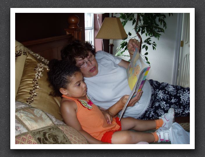 Nana reads to a tired Kayla