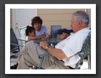 Kayla plays with Nana and Papa