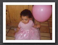 Matching dress and balloon