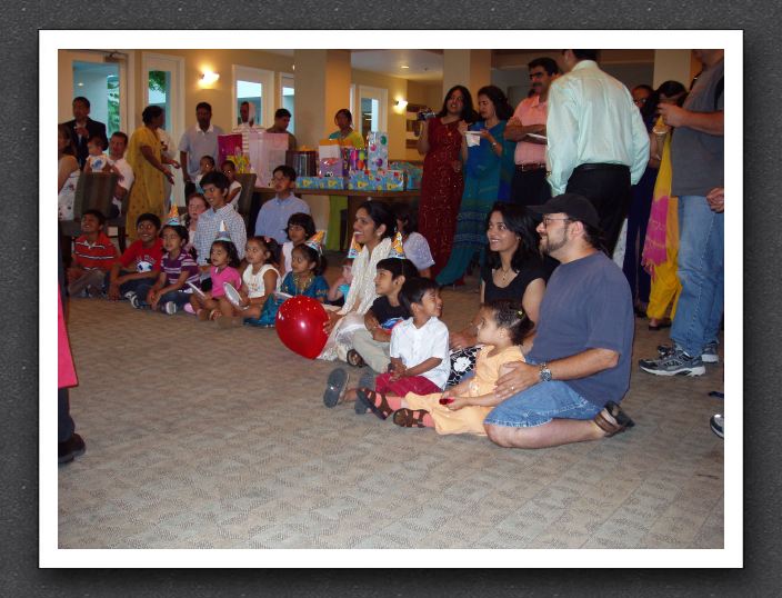 Kayla and Daddy watch the magic show