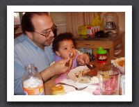 Kayla enjoys Grandma Daisy's fried chicken