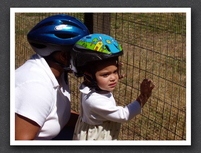 Mommy and Kayla watch the goats