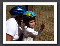 Mommy and Kayla watch the goats