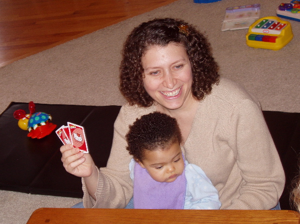 Kayla helps Aunt Jenn play Uno