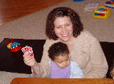 Kayla helps Aunt Jenn play Uno