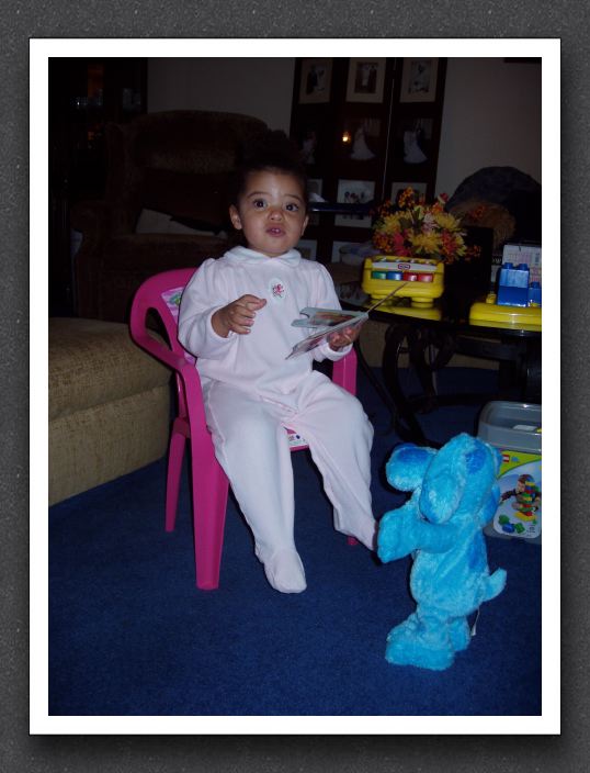 Kayla reads to Blue