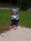 Tie-dye girl in a swing