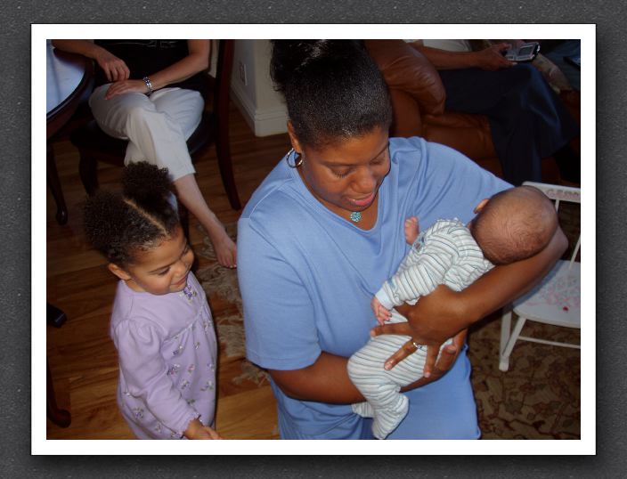 Val holds baby Joey