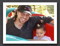 Kayla and Daddy on the Worm Ride