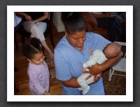 Val holds baby Joey