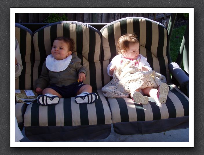 Joey and Natalie on a patio swing