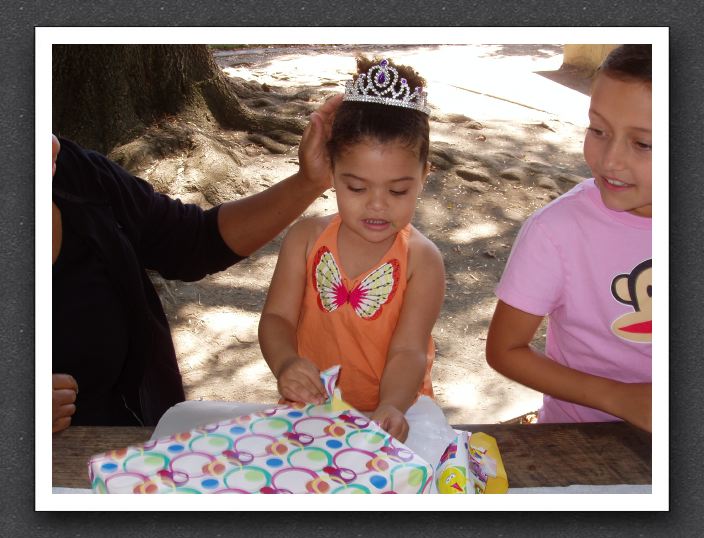 The princess opens her presents